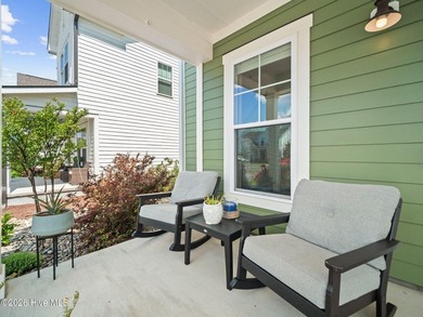Some homes check boxes. This one sets standards. Nestled in the - photo 5