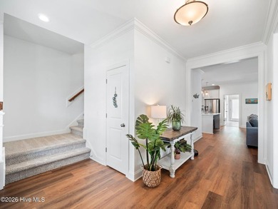 Some homes check boxes. This one sets standards. Nestled in the - photo 7