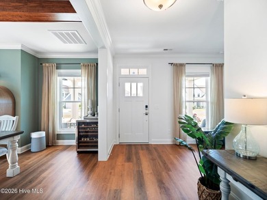 Some homes check boxes. This one sets standards. Nestled in the - photo 9