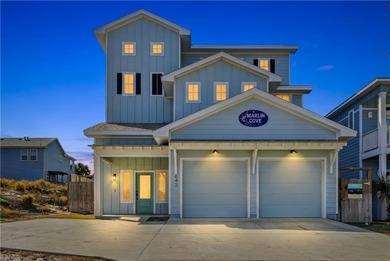 Experience coastal luxury in this stunning 3-story Port Aransas