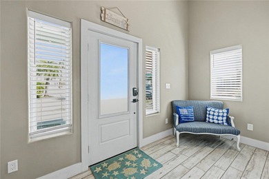 Experience coastal luxury in this stunning 3-story Port Aransas