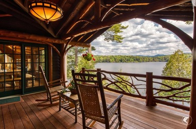 Kiwassa Lake Lodge sits above the shoreline in a way that - photo 11