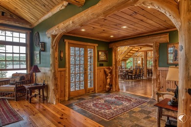 Kiwassa Lake Lodge sits above the shoreline in a way that - photo 15