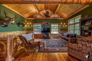Kiwassa Lake Lodge sits above the shoreline in a way that - photo 19