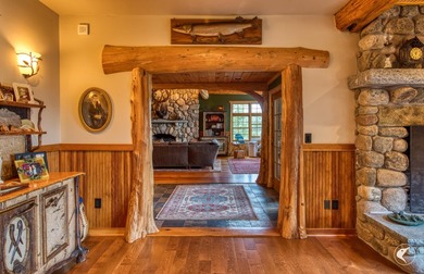 Kiwassa Lake Lodge sits above the shoreline in a way that - photo 20