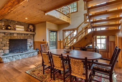 Kiwassa Lake Lodge sits above the shoreline in a way that - photo 21