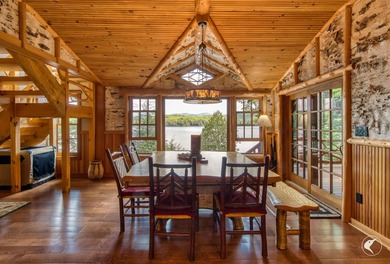 Kiwassa Lake Lodge sits above the shoreline in a way that - photo 22