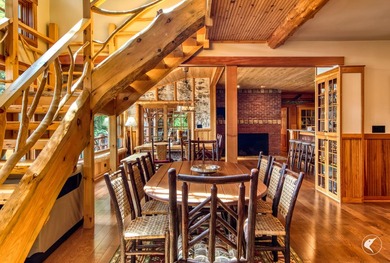 Kiwassa Lake Lodge sits above the shoreline in a way that - photo 23