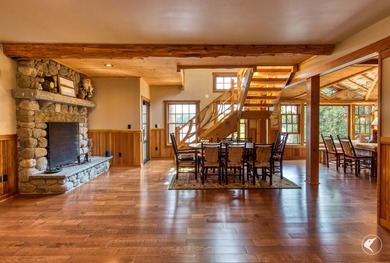 Kiwassa Lake Lodge sits above the shoreline in a way that - photo 25