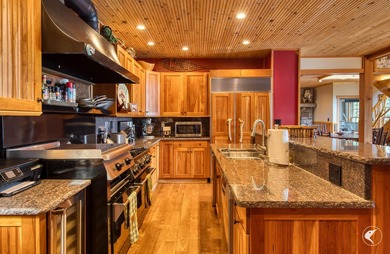 Kiwassa Lake Lodge sits above the shoreline in a way that - photo 27