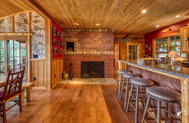 Kiwassa Lake Lodge sits above the shoreline in a way that - photo 28