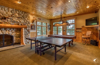 Kiwassa Lake Lodge sits above the shoreline in a way that - photo 29