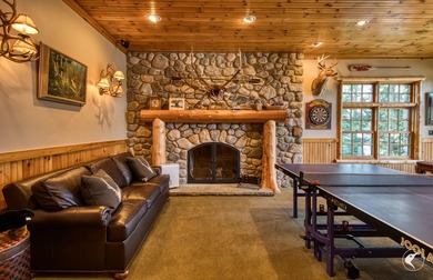 Kiwassa Lake Lodge sits above the shoreline in a way that - photo 31