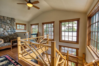 Kiwassa Lake Lodge sits above the shoreline in a way that - photo 35