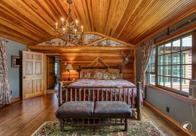 Kiwassa Lake Lodge sits above the shoreline in a way that - photo 38