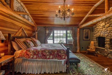Kiwassa Lake Lodge sits above the shoreline in a way that - photo 39