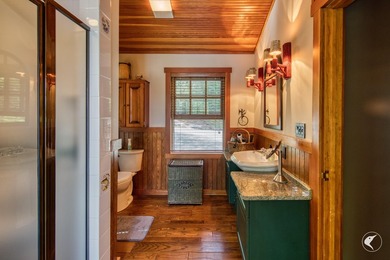 Kiwassa Lake Lodge sits above the shoreline in a way that - photo 41