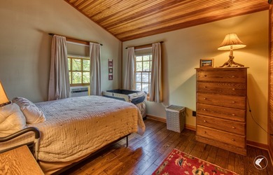 Kiwassa Lake Lodge sits above the shoreline in a way that - photo 44