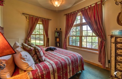 Kiwassa Lake Lodge sits above the shoreline in a way that - photo 48