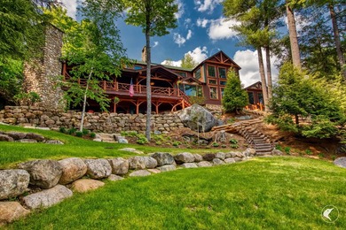 Kiwassa Lake Lodge sits above the shoreline in a way that - photo 56