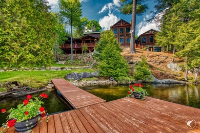 Kiwassa Lake Lodge sits above the shoreline in a way that - photo 57
