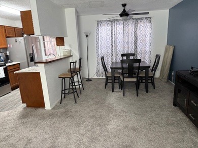 Cute 1 bedroom 1 bath unit. Bedroom and full bath upstairs. Half - photo 3