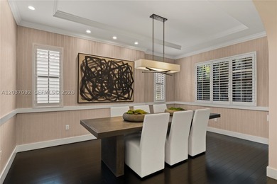 Completely renovated in 2025, this gated three-story residence - photo 11