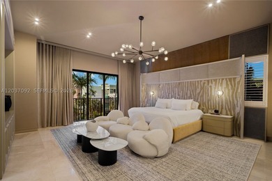 Completely renovated in 2025, this gated three-story residence - photo 12