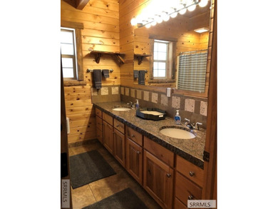 Beautiful cabin located near the Island Park Golf Course! With - photo 13