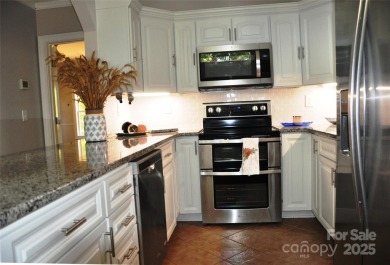 Great price improvement! This custom-built waterfront home on - photo 16