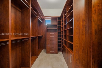 Completely renovated in 2025, this gated three-story residence - photo 16