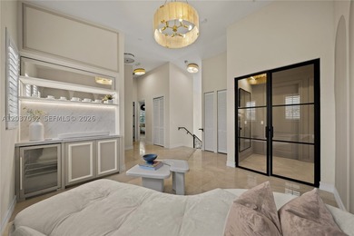Completely renovated in 2025, this gated three-story residence - photo 17