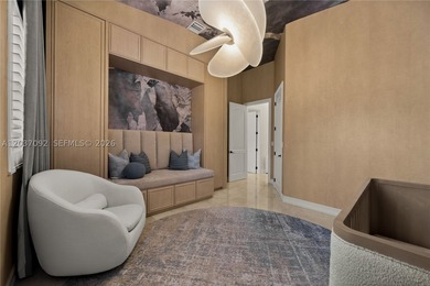 Completely renovated in 2025, this gated three-story residence - photo 19