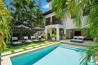 Completely renovated in 2025, this gated three-story residence - photo 25