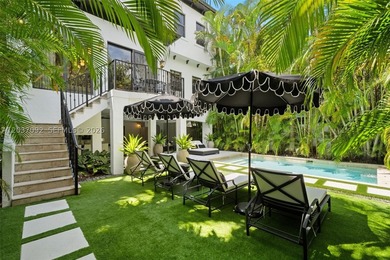Completely renovated in 2025, this gated three-story residence - photo 26
