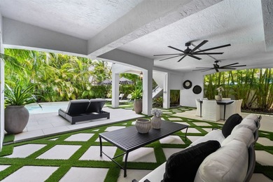 Completely renovated in 2025, this gated three-story residence - photo 27