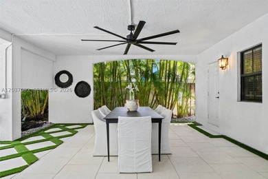 Completely renovated in 2025, this gated three-story residence - photo 28