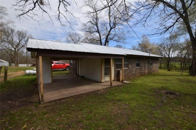 Lake Home For Sale in Stilwell, Oklahoma