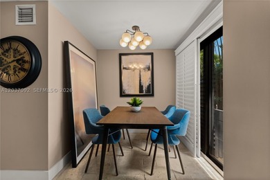 Completely renovated in 2025, this gated three-story residence - photo 31