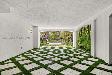 Completely renovated in 2025, this gated three-story residence - photo 33