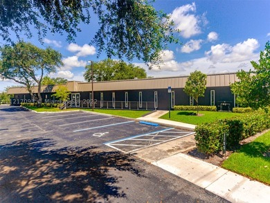 Free standing on a large corner lot commercial building - photo 13