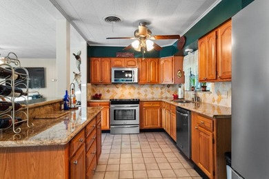 Welcome to 311 Rayburn Blvd, a rare gem tucked into the heart of - photo 13