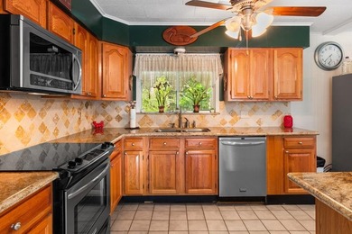 Welcome to 311 Rayburn Blvd, a rare gem tucked into the heart of - photo 14
