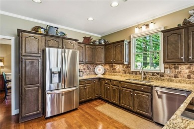 Welcome home to 3876 High Green Drive, set on a cul-de-sac in - photo 6