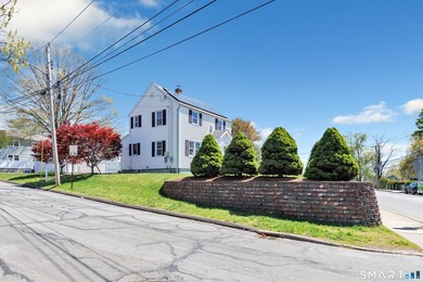 Welcome to 1400 Reservoir Avenue! This updated colonial in the - photo 3