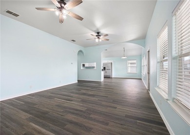 Beautifully positioned on the water along Laguna Shores, this - photo 4
