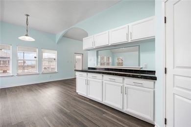 Beautifully positioned on the water along Laguna Shores, this - photo 8