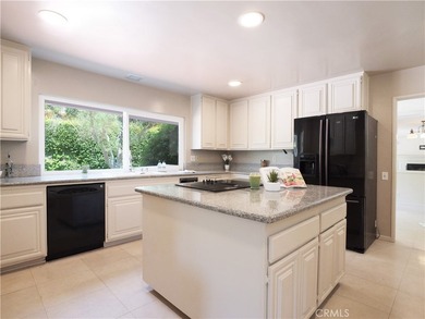 Situated on a quiet street overlooking a lush greenbelt in the - photo 12