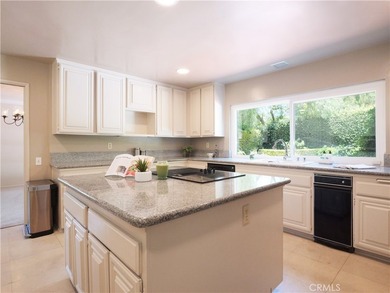 Situated on a quiet street overlooking a lush greenbelt in the - photo 13