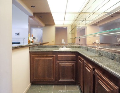 Situated on a quiet street overlooking a lush greenbelt in the - photo 17